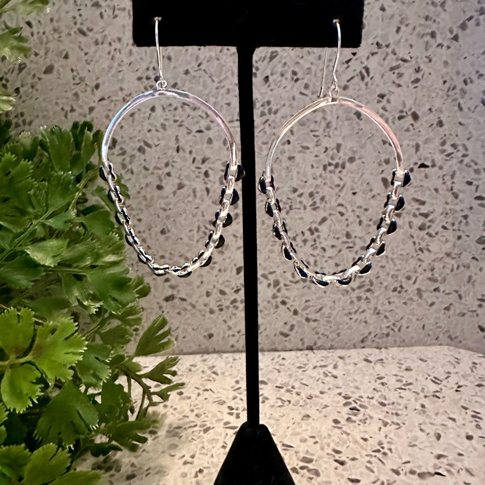 Silver tone earrings with black enamel Hearts